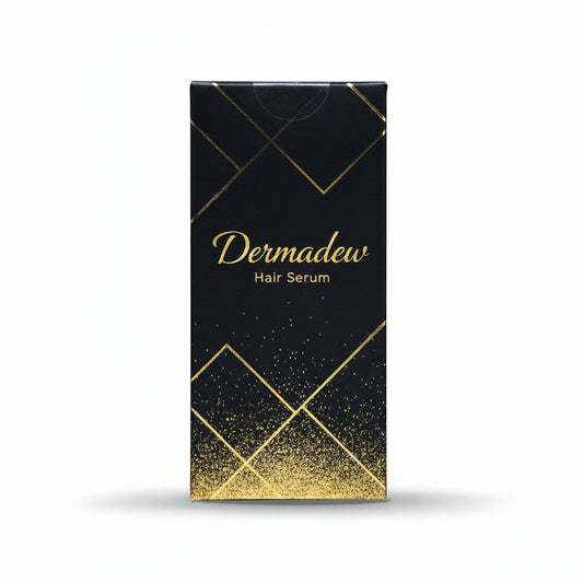 A tall rectangular black box for Dermadew Hair Serum, decorated with elegant gold geometric lines, a subtle glittery gold gradient at the bottom, and gold lettering, set against a plain white background.