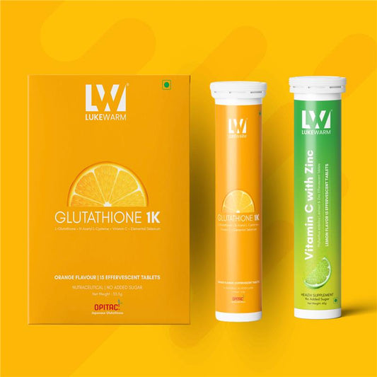 Packaging of Lukewarm Glutathione 1K Orange Flavour Effervescent and Vitamin C with Zinc Effervescent tablets with a yellow and orange color scheme.
