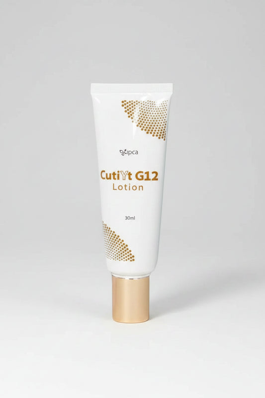 A 30ml squeeze tube of lipca Cutivt G12 Lotion, featuring a white body with gold dotted pattern accents and a metallic gold cap, set against a plain white background.
