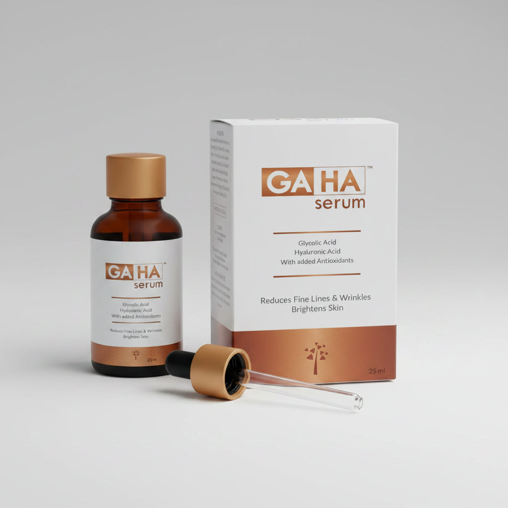 GAHA Serum bottle with amber cap next to its white and brown box, with a glass dropper shown in front on a white background.