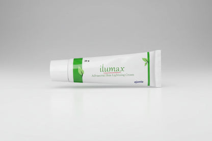 A white squeeze tube of ilumax Advanced Skin Lightning Cream with green leaf accents and branding, shown on a clean white background.