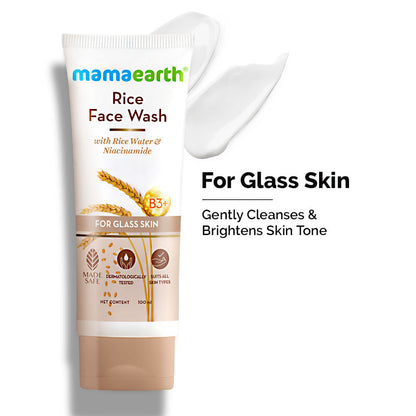 Mamaearth Rice Face Wash packaging with a swatch of cream on a white background