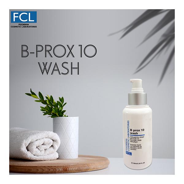FCL B-Prox 10 Wash bottle with towel and plant on a gray background
