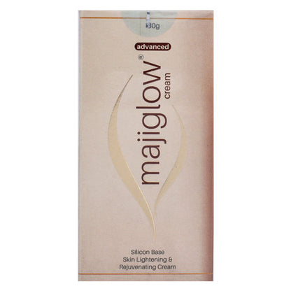 Packaging of Majiglow Advanced Cream, showing the product name and the text 'Silicon Base Skin Lightening & Rejuvenating Cream'. The package is primarily pink and white.