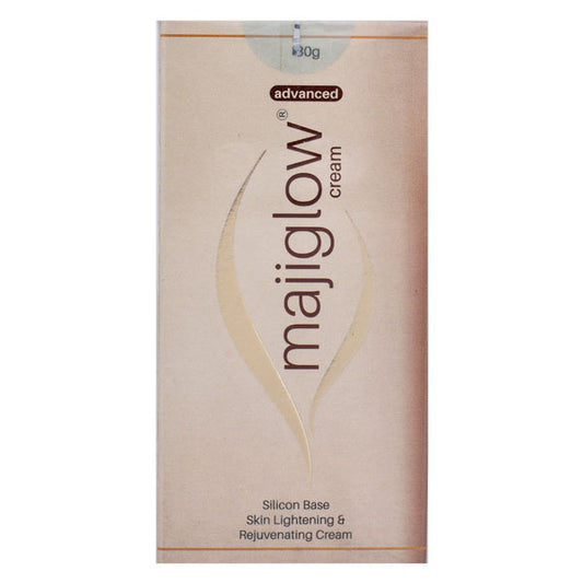 Packaging of Majiglow Advanced Cream, showing the product name and the text 'Silicon Base Skin Lightening & Rejuvenating Cream'. The package is primarily pink and white.