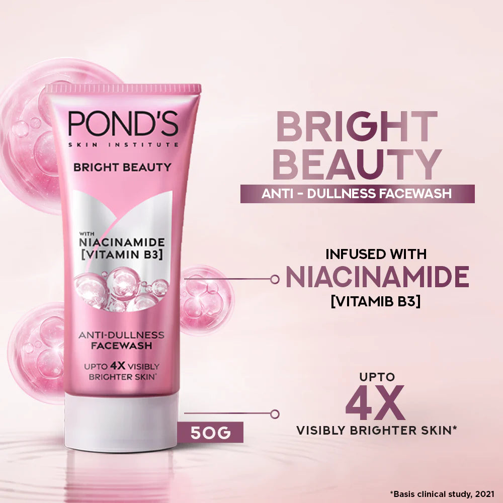 Pond's Bright Beauty Anti-Dullness Facewash tube with product details on a pink background